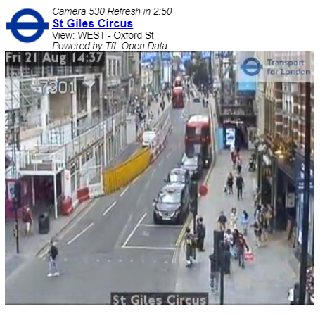 伦敦圣贾尔斯马戏团的交通监控录像片段。汽车、行人和公共汽车在图像中清晰可见。